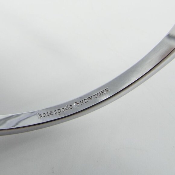 Kate Spade Silver and Gold Tone Bow Bangle Bracelet - Picture 7 of 7